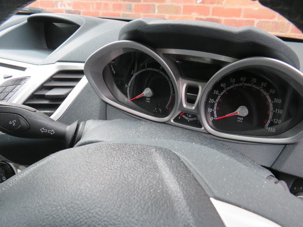 A BLACK 2011 1.4L PETROL FORD FIESTA 'BF61 HVR', LOG BOOK, TWO KEYS, CURRENTLY SORN, MILEAGE AT LAST - Image 10 of 12