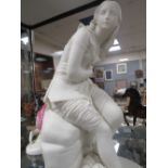 A LARGE PARIAN WARE FIGURE OF A LADY SITTING ON A ROCK A/F