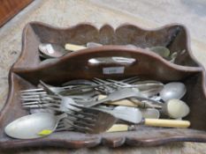A TREEN HANDLED CUTLERY TRAY AND CONTENTS