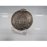 AN ANTIQUE SILVER ATA MEDAL