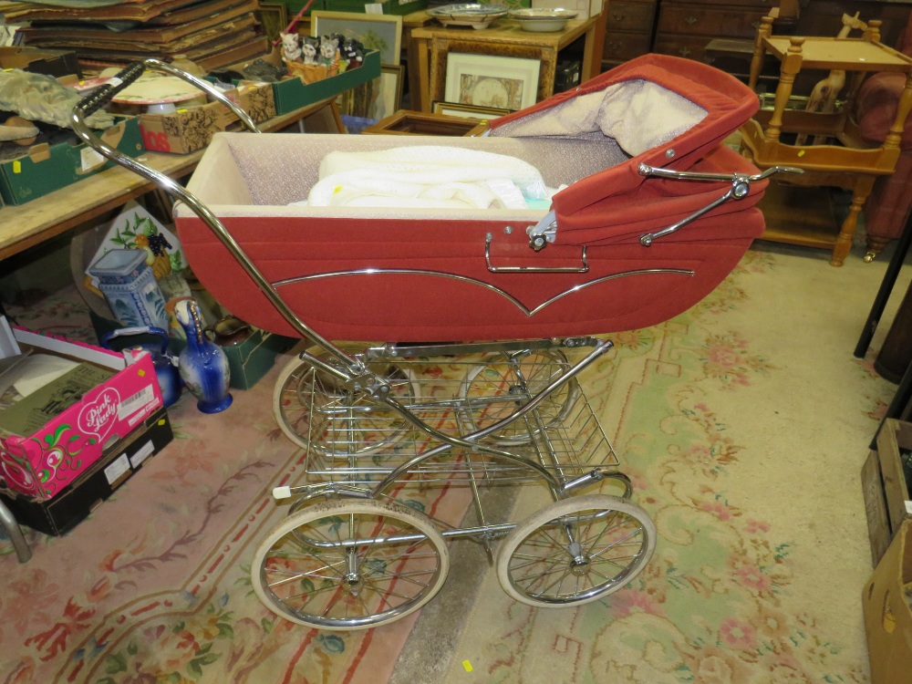 A VINTAGE SILVER CROSS PRAM