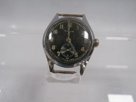 A VINTAGE MILITARY WRISTWATCH BY HELVETIA