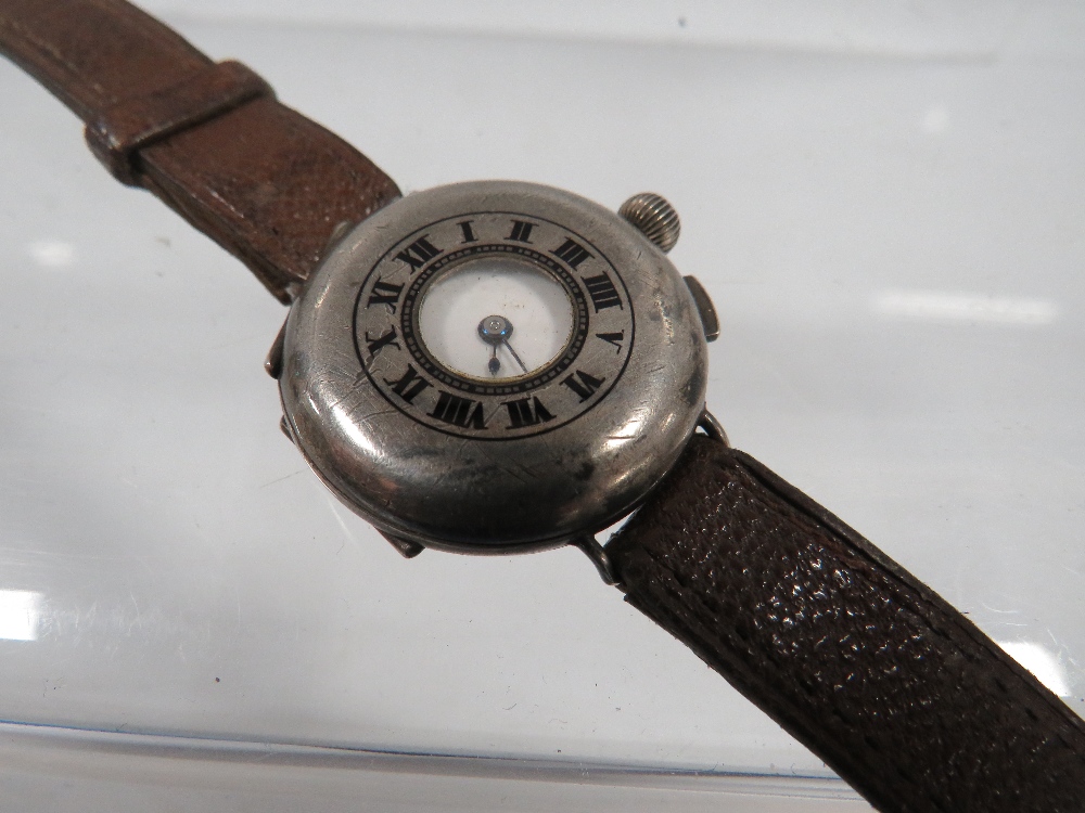 AN ANTIQUE TRENCH WRISTWATCH WITH SILVER HUNTING STYLE CASE - Image 2 of 4