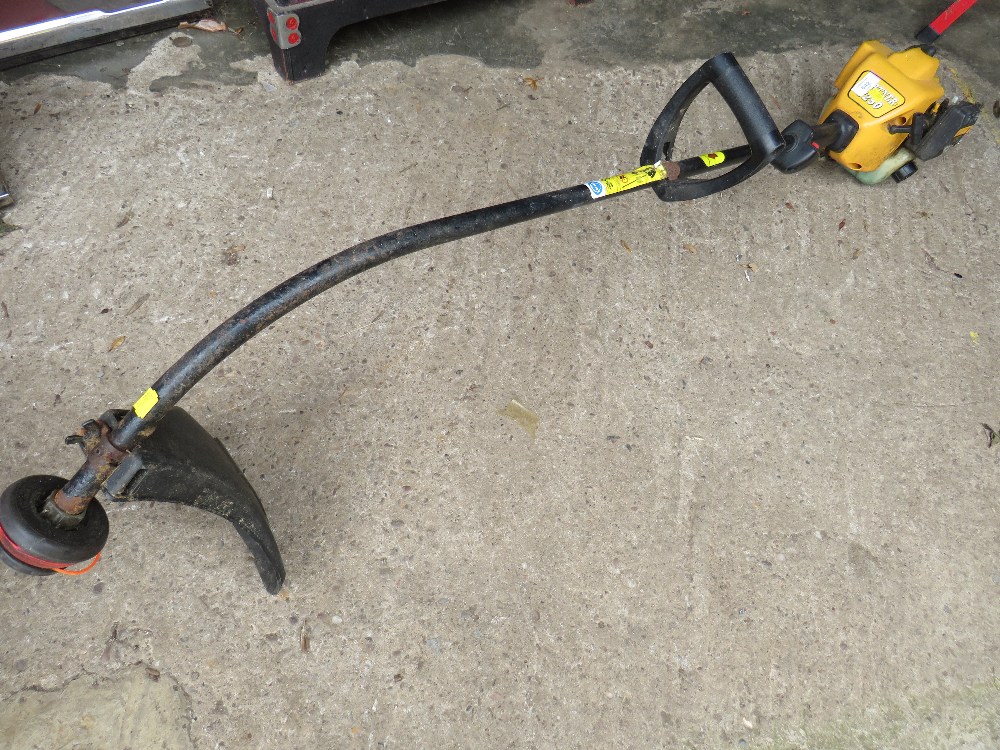 A PARTNER PETROL STRIMMER