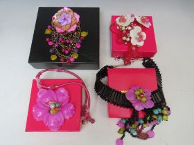 FOUR BUTLER AND WILSON FLORAL THEMED SHELL AND BEAD JEWELLERY ITEMS, comprising three necklaces
