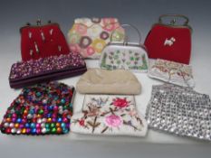 A COLLECTION OF BUTLER AND WILSON WORLD HANDBAGS, of varying colours, sizes and styles, to include