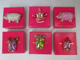 A COLLECTION OF SIX BUTLER AND WILSON COSTUME BROOCHES, to include a pink pig - W 6 cm, an AB