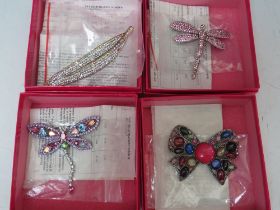 FOUR ASSORTED BUTLER AND WILSON COSTUME BROOCHES, comprising a pink dragonfly - W 7 cm, a