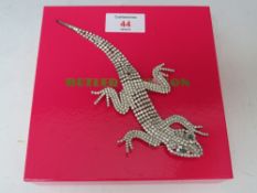 A BUTLER AND WILSON ARTICULATED LIZARD BROOCH, L 18 cm