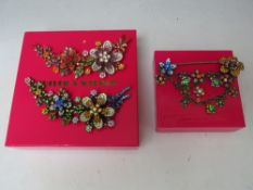 TWO BUTLER AND WILSON FLORAL SPRAY ARTICULATED BROOCHES, L 14.5 cm, together with a similar kilt pin