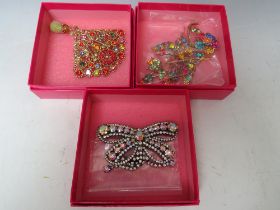 A COLLECTION OF THREE BUTLER AND WILSON BROOCHES, comprising a large floral / butterfly brooch - H