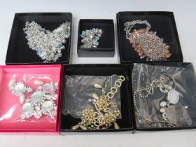 A COLLECTION OF BUTLER AND WILSON JEWELLERY ITEMS, to include a necklace and earring set, pearl