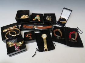 A COLLECTION OF JOAN RIVERS JEWELLERY ITEMS, to include two gilt & enamel hinged bangles, a pear