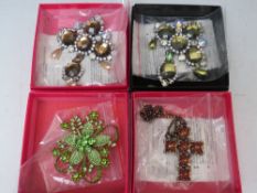 A COLLECTION OF ASSORTED BUTLER AND WILSON COSTUME BROOCHES, to include a citrus green floral brooch