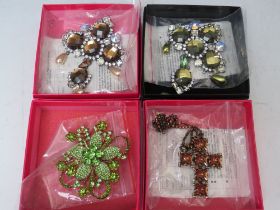 A COLLECTION OF ASSORTED BUTLER AND WILSON COSTUME BROOCHES, to include a citrus green floral brooch
