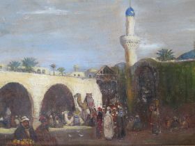 A LATE 19TH / EARLY 20TH CENTURY EASTERN STREET SCENE, with camels and numerous figures,