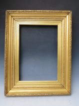 A 19TH CENTURY GOLD FRAME, with acanthus leaf design to outer edge and gold slip, frame W 8 cm, slip