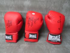 THREE SIGNED BOXING GLOVES, to include Joe Calzaghe, Chris Eubank and Michael Watson
