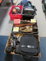 FOUR TRAYS OF CAMERAS AND A BAG