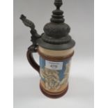 AN ANTIQUE METTLACH STYLE BEER STEIN SIGNED BRANDST