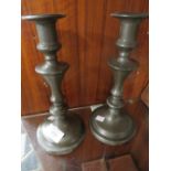 A PAIR OF ANTIQUE PEWTER CANDLESTICKS