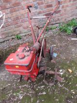 A VINTAGE MERRY WOLSELEY TILLER ROTIVATOR