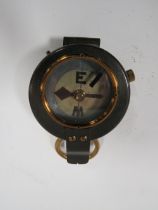 AN ANTIQUE MILITARY COMPASS