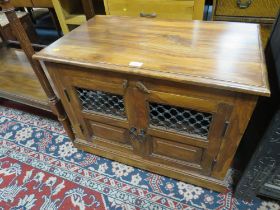 A COLONIAL STYLE CABINET