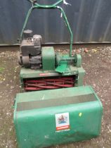 A RANSOMES 24 CYLINDER LAWN MOWER WITH GRASS MOWER