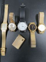 A COLLECTION OF VINTAGE WATCHES TOGETHER WITH A CIGARETTE LIGHTER