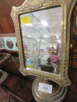 A BRASS DRESSING TABLE MIRROR