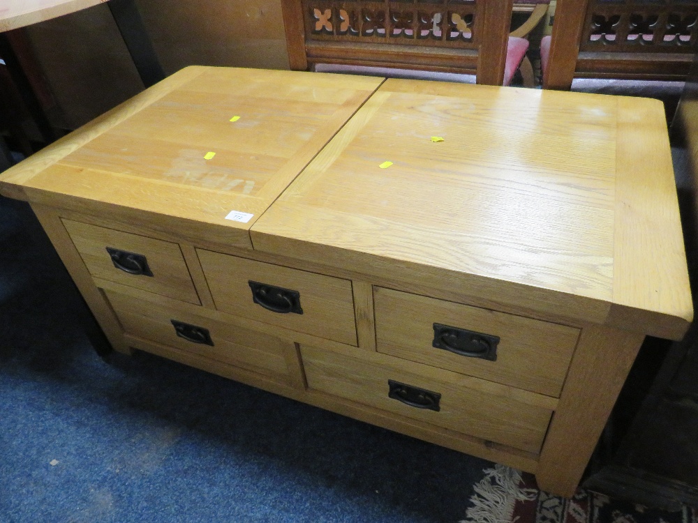 A LIGHT OAK COFFEE TABLE WITH SLIDING TOP & DRAWERS A/F