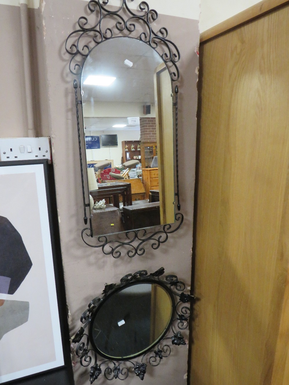 TWO VINTAGE WROUGHT WALL MIRRORS