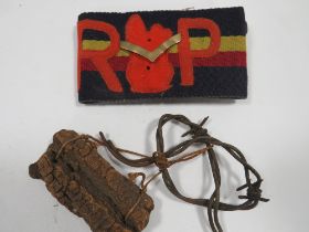 TWO MILITARY ITEMS - ONE ARM BAND , OTHER ITEM DATED 1907 ( POSSIBLY A WAY SIGN )