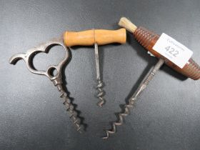 THREE ANTIQUE AND VINTAGE CORKSCREWS