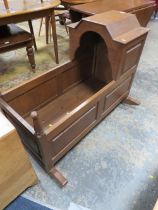 A LARGE OAK VINTAGE CHILDS CRADLE