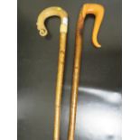 A SHEPHERDS CROOK TOGETHER WITH A WALKING STICK (2)