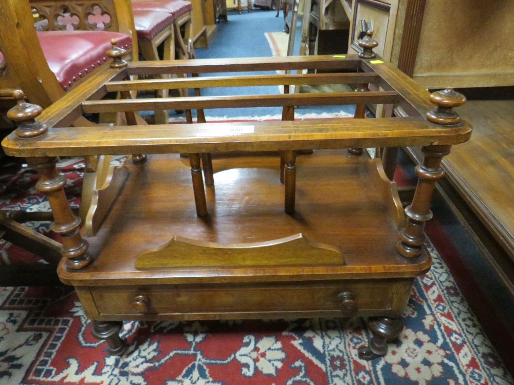 A 19TH CENTURY WALNUT AND INLAID CANTERBURY WITH DRAWER, RAISED ON CASTORS - W 56 CM