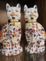 A PAIR OF REPRODUCTION ORIENTAL STYLE CERAMIC CATS