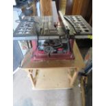 AN ELECTRIC TABLE TOP SAW AND BENCH - POWER DEVIL