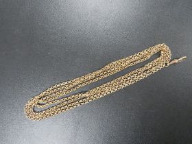 A VICTORIAN ROLLED GOLD MUFF/LONG CHAIN - 54" LONG
