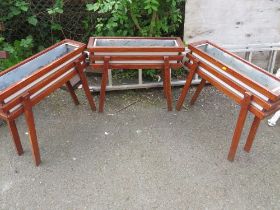 THREE WOODEN PLANT TROUGHS ON LEGS