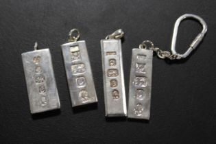 FOUR ASSORTED HALLMARKED SILVER PENDANTS ETC IN THE FORM OF SILVER INGOTS (APPROX OVERALL WEIGHT 112