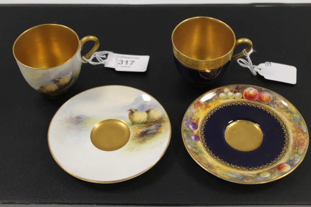 A PAIR OF ROYAL WORCESTER CABINET CUPS AND SAUCERS INCLUDING SHEEP AND FRUIT