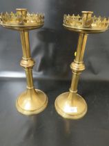 A PAIR OF ECCLESIASTICAL CANDLESTICKS WITH TWO MAKERS STAMPS PH & C THE OTHER BEING A ROSE OVER A