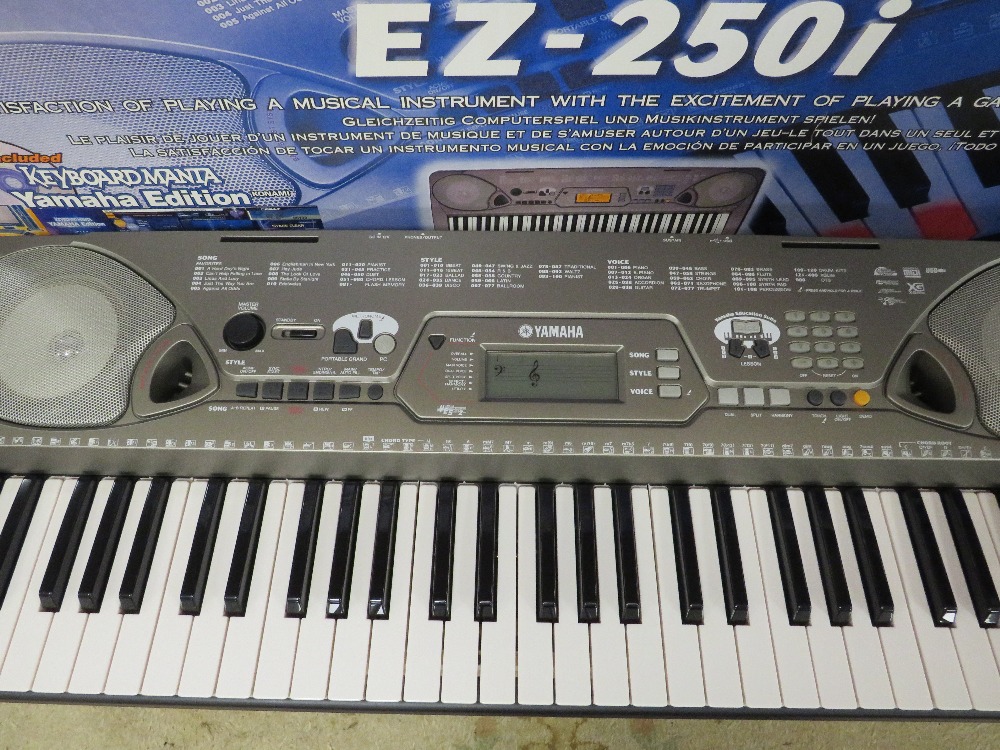 A BOXED YAMAHA PORTATONE EZ250i KEYBOARD WITH ACCESSORIES - Image 4 of 5