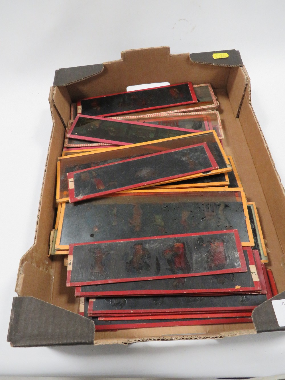 A SMALL TRAY OF 19TH CENTURY MAGIC LANTERN SLIDES