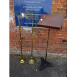 TWO ECCLESIASTICAL BRASS CANDLE STANDS TOGETHER WITH A LECTURN - 'ST MARYS ABBEY'
