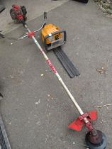 A HOMELITE PETROL STRIMMER AND A PETROL McCULLOCH HEDGE TRIMMER