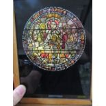 A VINTAGE FRAMED SMALL STAINED GLASS WINDOW ON STAND